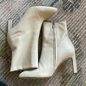 Cream colored heeled booties